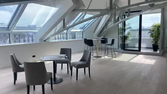 Expose Skyview-Penthouse auf drei Ebenen mit historischem Flair