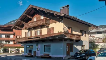 Expose Wohn- und Geschäftshaus in zentraler Lage