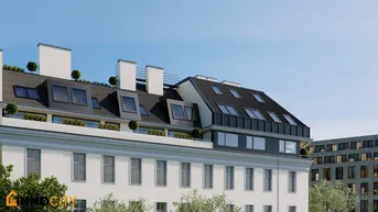 Moderne Dachgeschossarchitektur mit vielen Dachfenstern und begrünten Terrassenbereichen unter blauem Himmel.