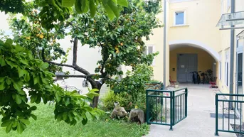 Expose ENTZÜCKENDE WOHNUNG MIT GARTENMITBENÜTZUNG
