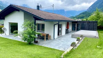 Expose Daheim in einem luxuriösen Kleinod mit herrlichem Garten und spektakulären Ausblicken