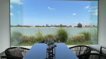Expose EXKLUSIVER BUNGALOW AM SEE - ERSTE REIHE MIT TRAUMHAFTEM AUSBLICK