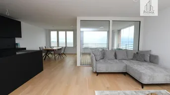 Expose Neuwertige 3-Zimmer Wohnung mit atemberaubender Seesicht