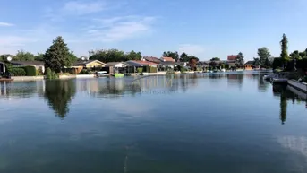 Expose Wohnen mit Seeblick – Charmantes Haus auf Pachtgrund in 2451 Au am Leithaberge