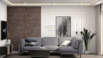 Modernes Wohnzimmer mit bequemer Eckcouch, Ziegelwandakzent und indirekter Deckenbeleuchtung.