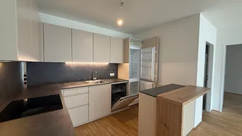 Expose Neubau Erstbezug I hochwertige Küche I Nähe Donau I Fußbodenheizung I Balkon I Tiefgarage I Fernwärme I
