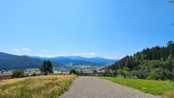 Expose Baugrundstück mit Bergpanorama und Top Anbindung