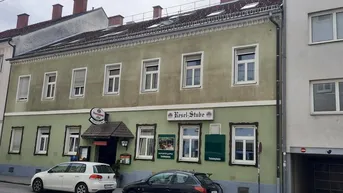 Expose Sanierungsbedürftiges Wohn- und Geschäftshaus mit hoher Baureserve
