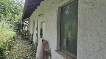 Expose Sanierungsbedürftiges Einfamilienhaus in Hanglage