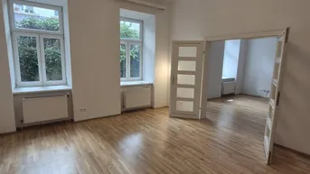 Expose Gartenwohnung mit 2 Zimmer und kleiner Terrasse in gepflegtem Altbau Zinshaus