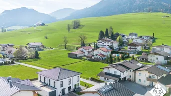 Expose Familientraum² – Grundstück für zwei Haushalte am Walchsee zu kaufen!