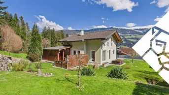Charmantes Einfamilienhaus mit gepflegtem Garten und herrlichem Bergblick in sonniger Lage.