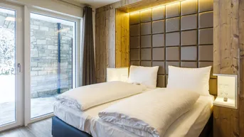 Expose Avenida Mountain Lodges Saalbach | Top 002 mit Gartenfläche
