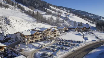 Expose Avenida Mountain Lodges Saalbach | Top 002 mit Gartenfläche