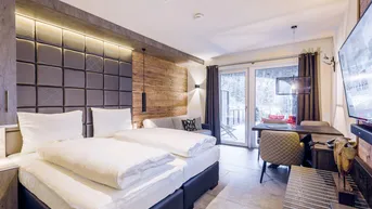 Expose Avenida Mountain Lodges Saalbach | Studio Suite mit Terrasse/kleiner Garten