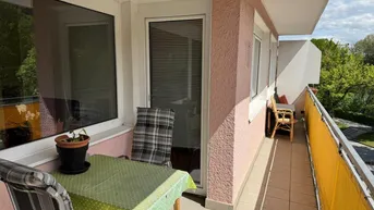 Expose Lichtdurchflutete DG-Wohnung mit Panoramablick &amp; Tiefgaragenbox