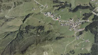 Expose Landwirtschaftliches Grundstück mit Alpen und Seen in der Ski Region Warth!