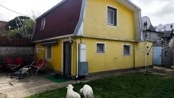 Expose Charmantes Einfamilienhaus in idyllischer Kleingartensiedlung nahe U1 „Altes Landgut“