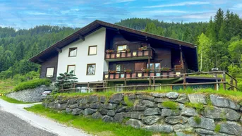 Expose Exklusives Wohnen im Skigebiet: Charmantes Alpenhaus mit 5 Wohneinheiten &amp; Ausbaupotential
