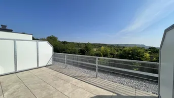 Expose Moderne Zwei-Zimmer Terrassenwohnung mit Fernblick Erstbezug