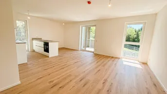 Expose Erstbezug - Geräumige 3-Raum-Wohnung mit 2 Balkonen und Einbauküche mit herrlichem Blick in die Natur! - Mietkauf