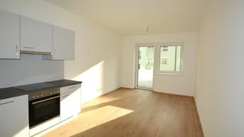 Expose Neuwertige 2-Zimmer Wohnung mit moderner Einbauküche und Balkon in aufstrebendem Wohnviertel!