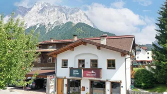 Expose Mitten im Leberkas-Hotspot: Wohn- und Geschäftshaus
