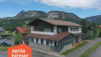 Expose Wohn-und Geschäftshaus - hier wo Arbeit auf Bergabenteuer trifft