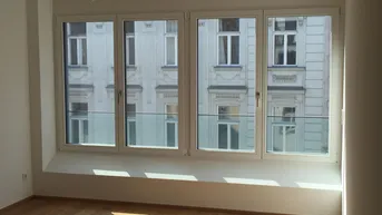 Expose Helle 2-Zimmer-Neubauwohnung mit Altbauflair im Siebten
