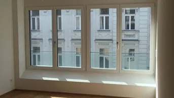 Expose Helle 2-Zimmer-Neubauwohnung mit Altbauflair im Siebten