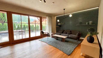 Expose Edles Design-Highlight mit Garten und traumhaftem Kaiserblick