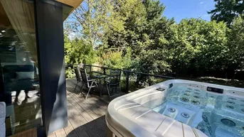 Expose Neuer Preis! Exklusiver Wohntraum: Einfamilienhaus mit Gartenjuwel an der Donauinsel