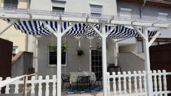 Expose Geräumiges Reihenhaus mit Garten, überdachter Terrasse und drei Etagen voller Möglichkeiten