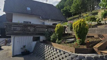 Expose Zwei Häuser, ein Zuhause – vielseitiges Wohnjuwel in idyllischer Lage