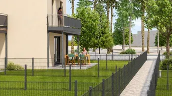 Außenansicht eines Hauses mit Balkon, Terrasse und gepflegtem Gartenbereich mit Gehwegen.