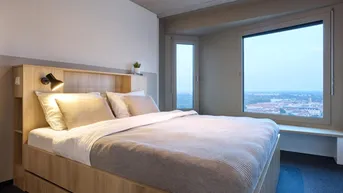 Expose District Living: möblierte 2-Zimmer Wohnung Platin Plus mit exklusiven Gemeinschaftsflächen inklusive: Fitness, Dachterrasse &amp; mehr