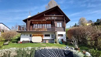 Expose Einzigartiges Vollholzhaus mit herrlichem Garten und Ausblick