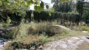 Expose Traumhaus mit großem Sonnengarten in erhöhter Grünlage!