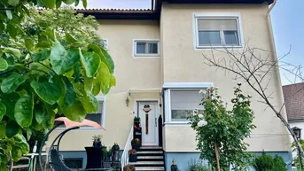 Expose Einfamilienhaus mit Garage in zentraler Ruhelage