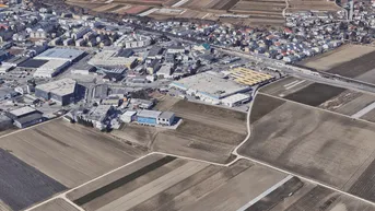 Expose 1.500 m² gewerblicher Grund in Neu-Rum zu verkaufen