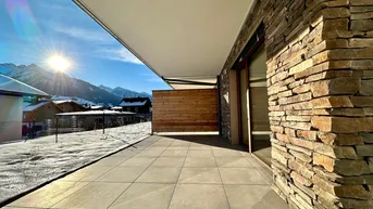 Expose Südseitige 4-Zimmer Gartenwohnung mit Steinfassade in sonniger Toplage