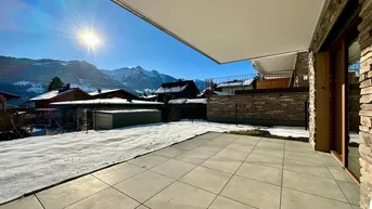 Expose Attraktive 4-Zimmer Gartenwohnung mit Steinfassade in sonniger Südlage