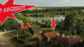 Expose Im Wohnpark in Hövej steht ein Ferienhaus/Wohnhaus am Teich in einer wunderschönen Umgebung zum Verkauf