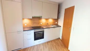 Expose 2-Zimmer Wohnung mit Aufzug, Garage &amp; Gemeinschaftsgarten