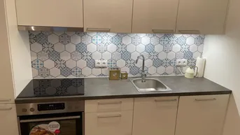 Expose Neubau 2-Zimmer Erdgeschosswohnung mit Terrasse. Anlageobjekt mit Garage, geringe Heiz- und Betriebskosten