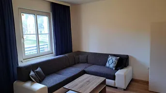 Expose Charmante Hochparterre-Wohnung mit eigenem Garten und PKW Abstellplatz in ruhiger Siedlungslage