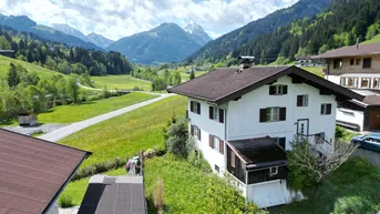 Expose Grundstück mit royalem Bergblick und Baubescheid