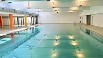 Expose Luxus trifft Natur: Hochwertige Wohnung in Grünruhelage mit Pool &amp; Wellness