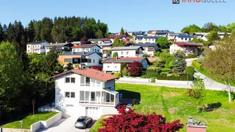 Expose Vielseitiges Wohnen mit Weitblick in Scheibbs - Zwei Wohneinheiten, großzügiger Garten, Terrassen &amp; unverbaubarer Blick über die Stadt