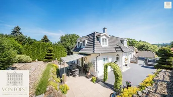 Expose Wunderschöne Landhausstil-Villa eingebettet in einem idyllischen Gartenparadies mit Schwimmteich und Whirlpool
